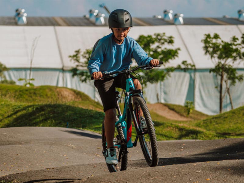 Train a kids mountain bike in a kids mountain bike park Train a kids mountain bike in a kids mountain bike park