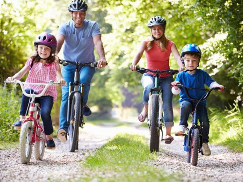 Family riding in the park Family riding in the park