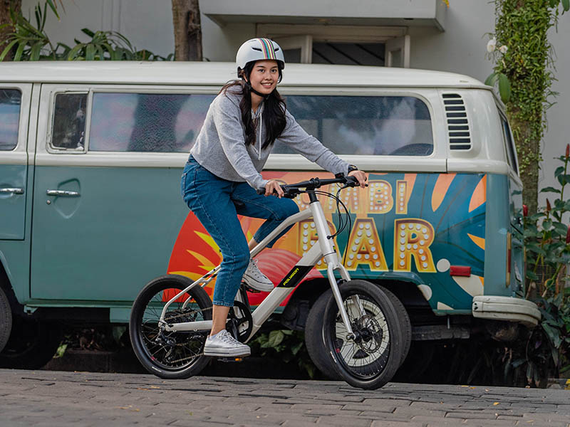 Female cyclist strolling around with a Polygon Gili Mini Velo Female cyclist strolling around with a Polygon Gili Mini Velo