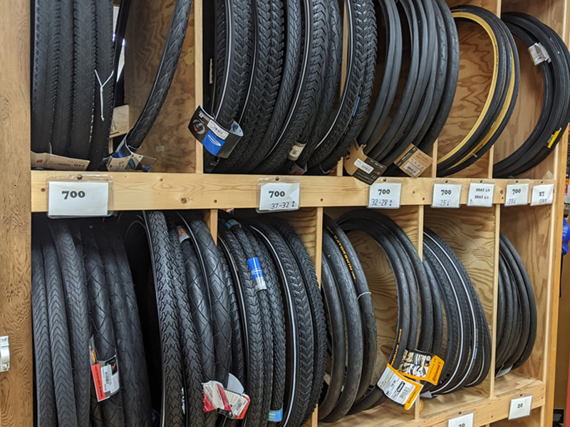 Gravel bike tires display in the bike shop Gravel bike tires display in the bike shop