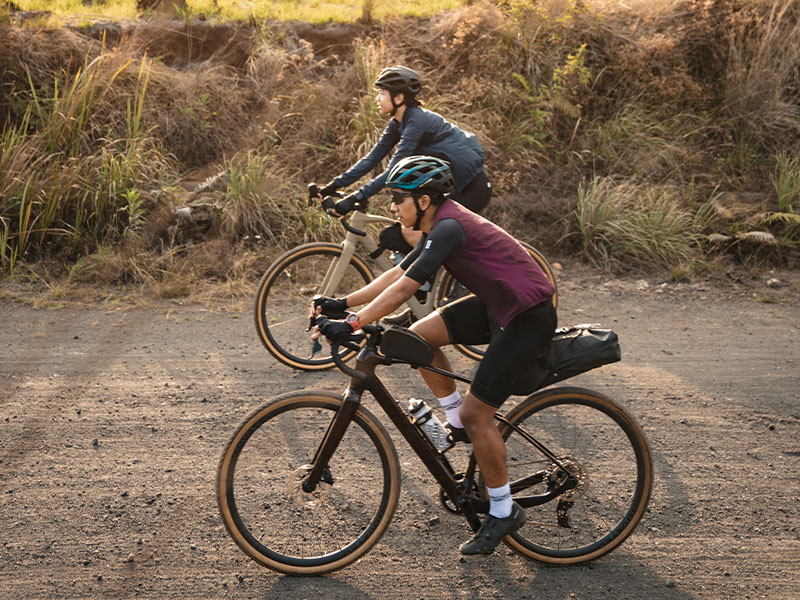 A gravel cyclist in a ready position before a ride A gravel cyclist in a ready position before a ride