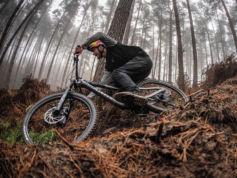 Carbon mountain bikes are powerful to tackle rough rocky trails Carbon mountain bikes are powerful to tackle rough rocky trails