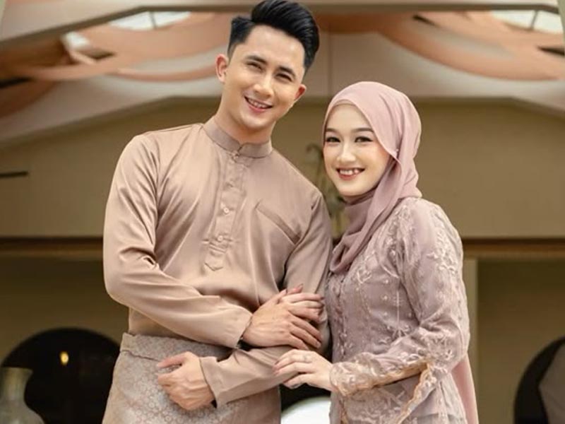 A couple with ideal body goals in Hari Raya A couple with ideal body goals in Hari Raya