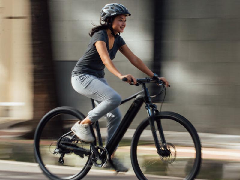 Cyclists ride fast on electric bicycles Cyclists ride fast on electric bicycles