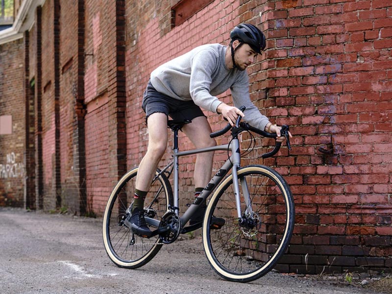 Cycling over a gravel path with a Marin gravel bike Cycling over a gravel path with a Marin gravel bike