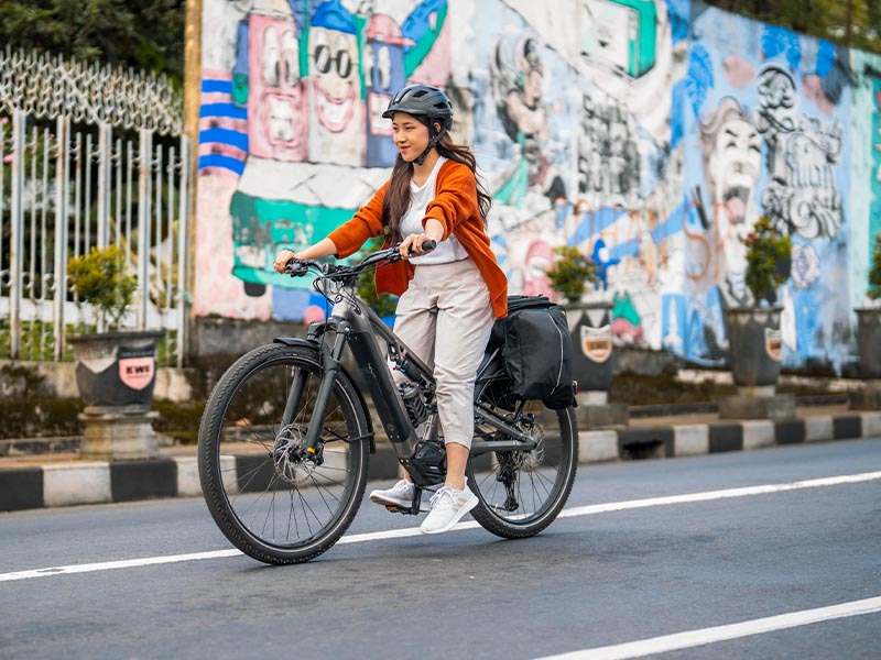 Enjoying the urban view with an electric bike Enjoying the urban view with an electric bike