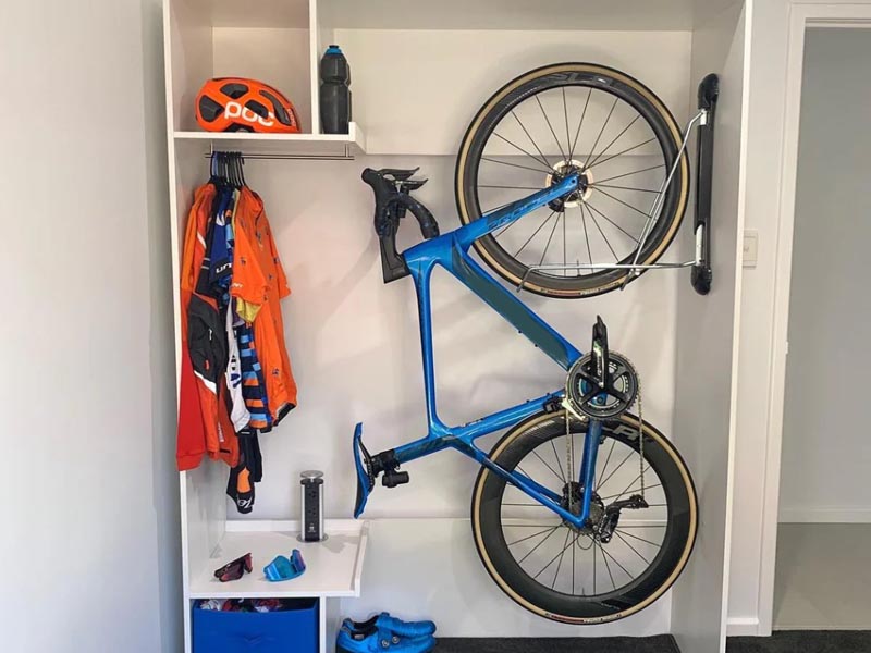 A bicycle stored in a small space A bicycle stored in a small space