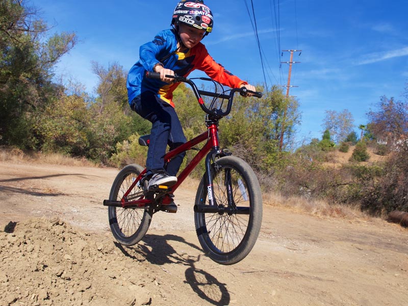 Riding a BMX bike in the BMX park Riding a BMX bike in the BMX park