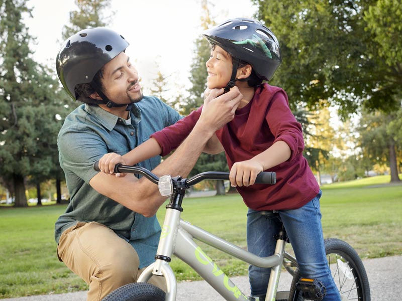 Wearing a BMX helmet before ride Wearing a BMX helmet before ride