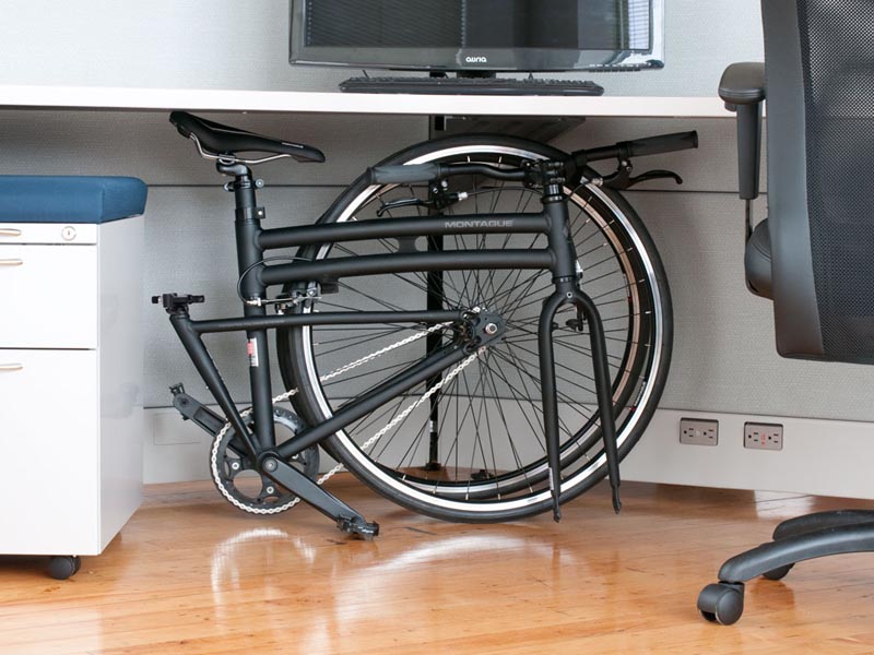 Storing a foldable bike below the table Storing a foldable bike below the table